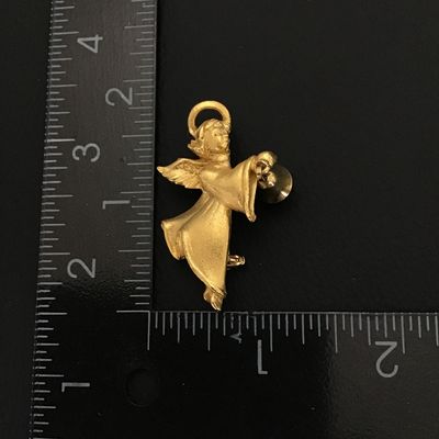 Gold tone angel brooch