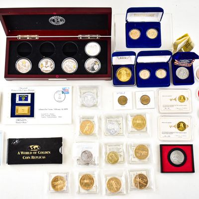 Sale Photo Thumbnail #47: ASSORTMENT OF COMMEMORATIVE COINS, COIN REPLICAS, MEDALS, AND U.S. DOLLAR COINS