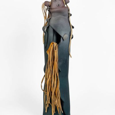 Elizabeth Abeyta Rohrscheib "Mudhead" Figure