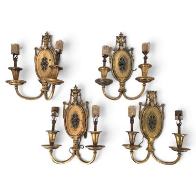 Four Lion Electric Gilt-Brass Sconces