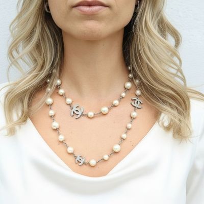 Sale Photo Thumbnail #211: CHANEL Pearl Sautoir Necklace with five CC Logos