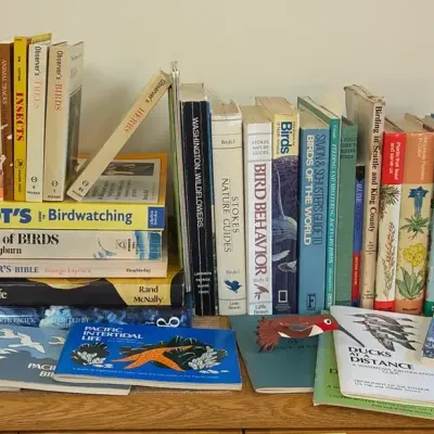 Bushnell Binoculars And A Collection Of Birdwatching Books 