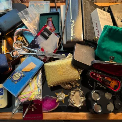 Sale Photo Thumbnail #25: glass case filled with treasures
