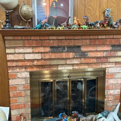 Sale Photo Thumbnail #23: fireplace mantel loaded to the gills with dinosaurs