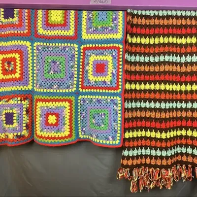 Colorful Crocheted Granny Square Blanket and Striped Scarf