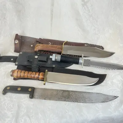 Collection of Fixed Blade Hunting, Survival, and Machete Knives