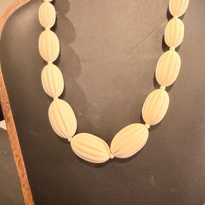 Vintage off white colored stripe beads necklace