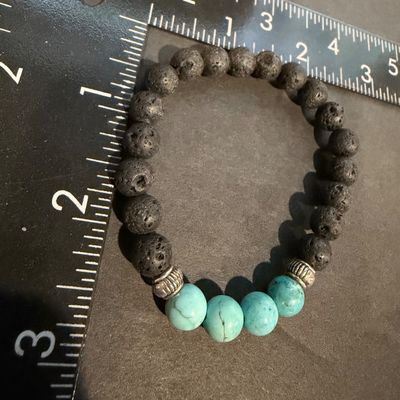 Turquoise stone type and lava beaded stretch bracelet