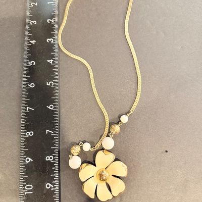 Vintage style gold tone off white floral necklace