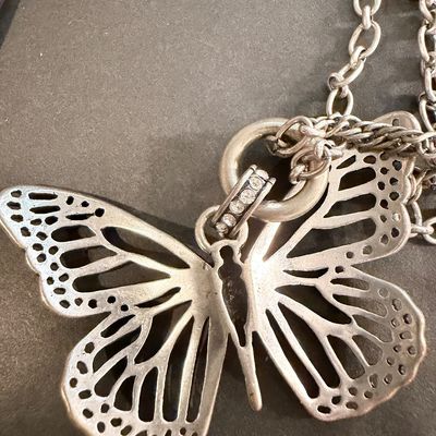 Vintage style silver tone butterfly necklace