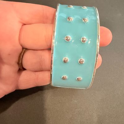Turquoise and silver tone fashion bracelet
