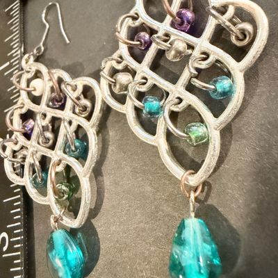 Silver tone statement dangle earrings
