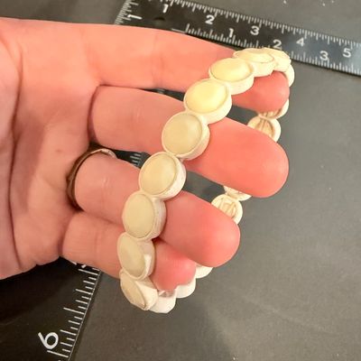 Off white colored stretch fashion bracelet
