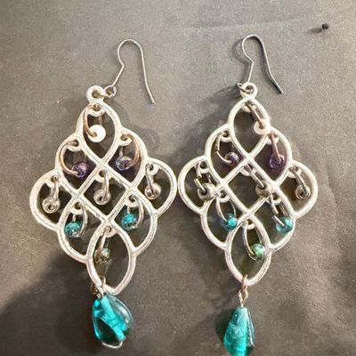 Silver tone statement dangle earrings