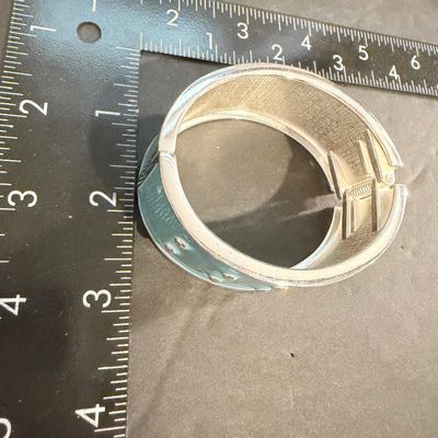 Turquoise and silver tone fashion bracelet