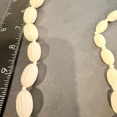 Vintage off white colored stripe beads necklace