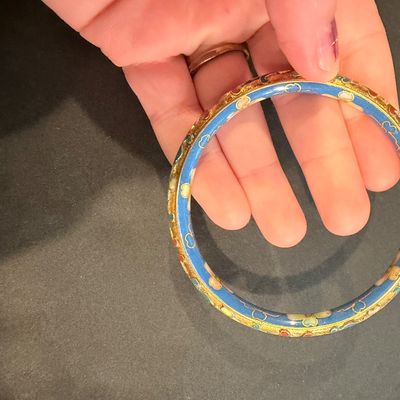 vintage-style gold-tone metal bangle bracelet featuring colorful floral and scroll enamel work Type