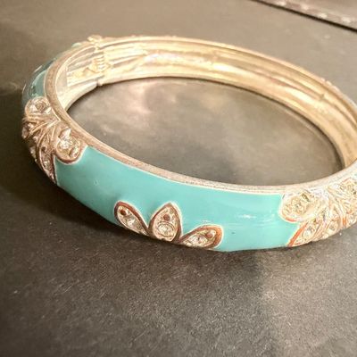 Silver tone rhinestone floral light blue bangle bracelet
