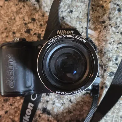 Nikon COOLPIX L110 Digital Camera with 15x Optical Zoom, Case & Accessories