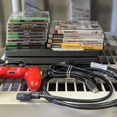 7016 playstation with controllers and games