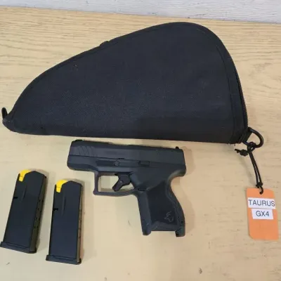 Sale Photo Thumbnail #7: Taurus GX4 9mm Pistol #1GC07631 Tag 297
2 Mags - Soft Case