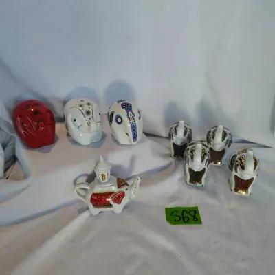 Nine Sri Lankan Elephant Themed Porcelain Tea Jars