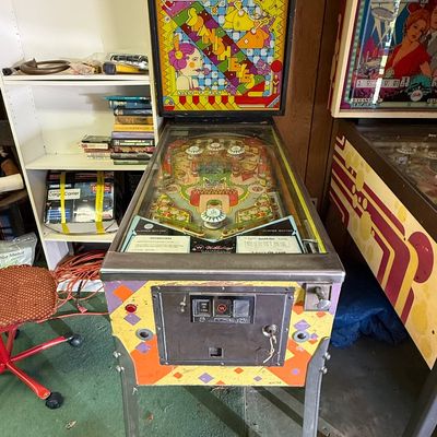 Vintage Williams "Spanish Eyes" pinball machine, released in 1972, featuring vibrant retro graphics on the backglass and cabinet.