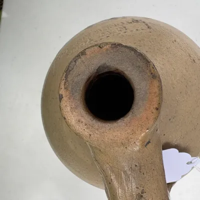 NEW YORK STONEWARE CO., HANDLED JUG WITH COBALT LEAVES