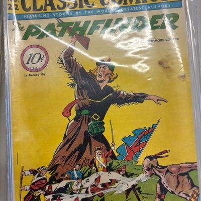 Classic Comics No. 22, "The Pathfinder" by James Fenimore Cooper, published in October 1944, showing some wear and stored in a...