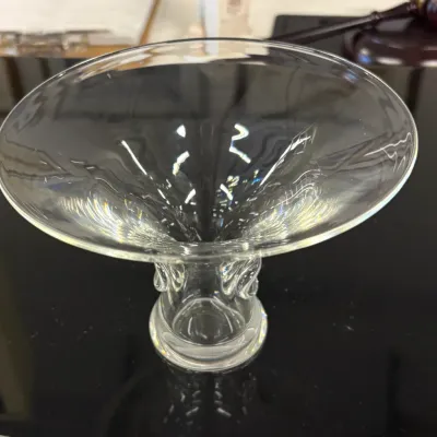 Steuben clear art glass compote bowl with a wide flared rim and a thick, pedestal base.