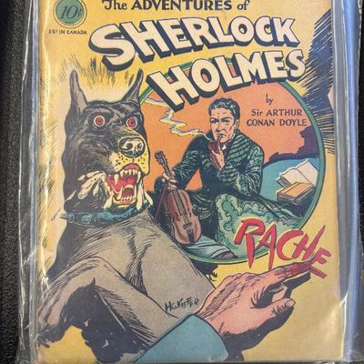 Classic Comics No. 33, "The Adventures of Sherlock Holmes" by Sir Arthur Conan Doyle, preserved in a protective plastic sleeve.