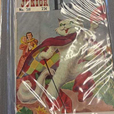 Vintage Classics Illustrated Junior comic book, No. 511, featuring "Puss in Boots," preserved in a protective plastic sleeve.
