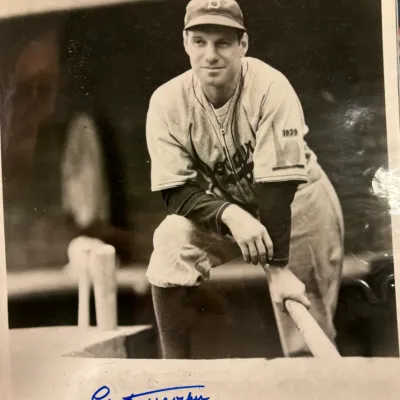 Autographed black and white photograph of Leo Durocher in a 1939 Brooklyn Dodgers uniform, signed in blue ink at the bottom.