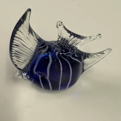 Hand-blown art glass fish figurine featuring a cobalt blue body with white vertical stripes and clear, textured fins.