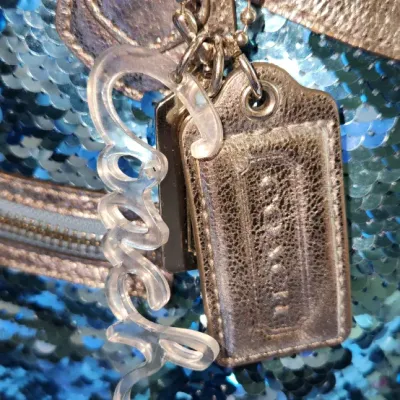 Sale Photo Thumbnail #525: Used - Vintage Coach 
Blue Poppy Sequin Purse
Signs of normal wear. 
See Photos.