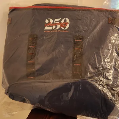 Sale Photo Thumbnail #348: Commemorative "America 250 Anniversary", soft-sided cooler bag, 
Color: Navy
Abt. 14" Tall x Abt. 18" Wide