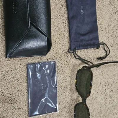 Sale Photo Thumbnail #422: Never been worn. Comes with case, a soft bag and cleaning cloth.