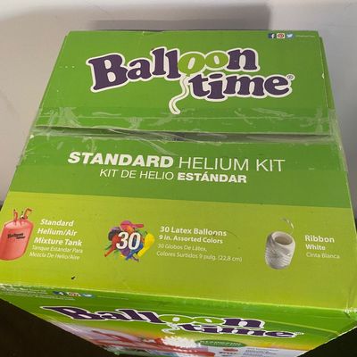 Sale Photo Thumbnail #530: Balloon Time Standard Helium Kit including a helium/air mixture tank, 30 latex balloons (9 in. assorted colors), and white ribbon.