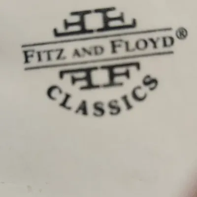 Sale Photo Thumbnail #64: Vintage 1990s Fitz & Floyd "Garden Rhapsody" ceramic basket featuring a charming sculpted duckling resting among pastel floral and twisted vine details. Small chip on Flower. Please see pic.