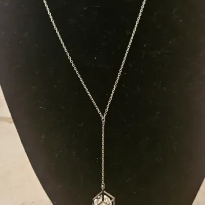 Sale Photo Thumbnail #121: Beautiful,delicate chain with a hanging pendant. This necklace catches the light and sparkles- perfect if you want to stand out. Perfect to give as a gift too!