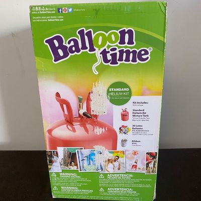 Sale Photo Thumbnail #529: Balloon Time Standard Helium Kit including a helium/air mixture tank, 30 latex balloons (9 in. assorted colors), and white ribbon.