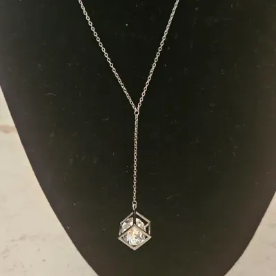 Sale Photo Thumbnail #120: Beautiful,delicate chain with a hanging pendant. This necklace catches the light and sparkles- perfect if you want to stand out. Perfect to give as a gift too!