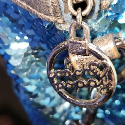 Sale Photo Thumbnail #524: Used - Vintage Coach 
Blue Poppy Sequin Purse
Signs of normal wear. 
See Photos.
