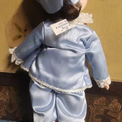 Sale Photo Thumbnail #482: Abt. 10"-12"-inches
Collector Edition with Original Tag.
**** Loose Head and Missing A Shoe
Doll Is In Great Condition Considering Age.