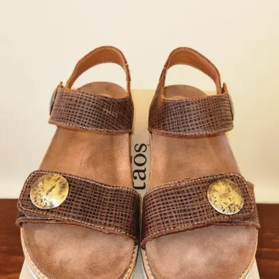 Sale Photo Thumbnail #320: Täōs Footwear Women's Top Shelf Sandal in the "Brown Embossed"
Size: 39
Like New, Includes Box
