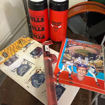 Sale Photo Thumbnail #461: Bulls insulated drink bottles, Rangers 1974 program  , Tiger woods posters and uncut trading cards