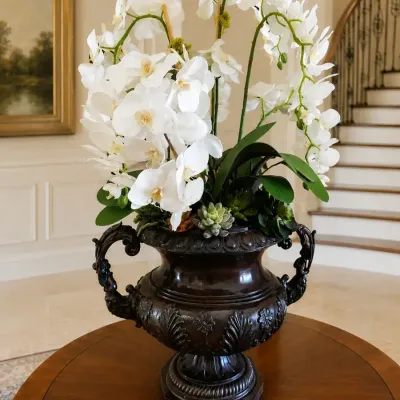 FAUX ORCHID ARRANGEMENT IN URN