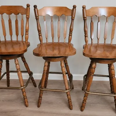 TRIO OF SWIVEL BAR STOOLS