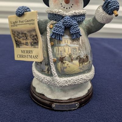 Sale Photo Thumbnail #62: Thomas Kinkade 4 pc Snowman and 1 Angel figurine