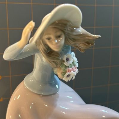 Sale Photo Thumbnail #222: "Lladro ""Blustery Day"" #5.588 boxed" Like new condition, no chips or flaws